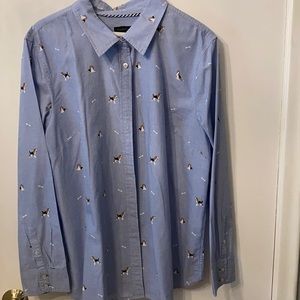 Blue blouse with dog and bone print.